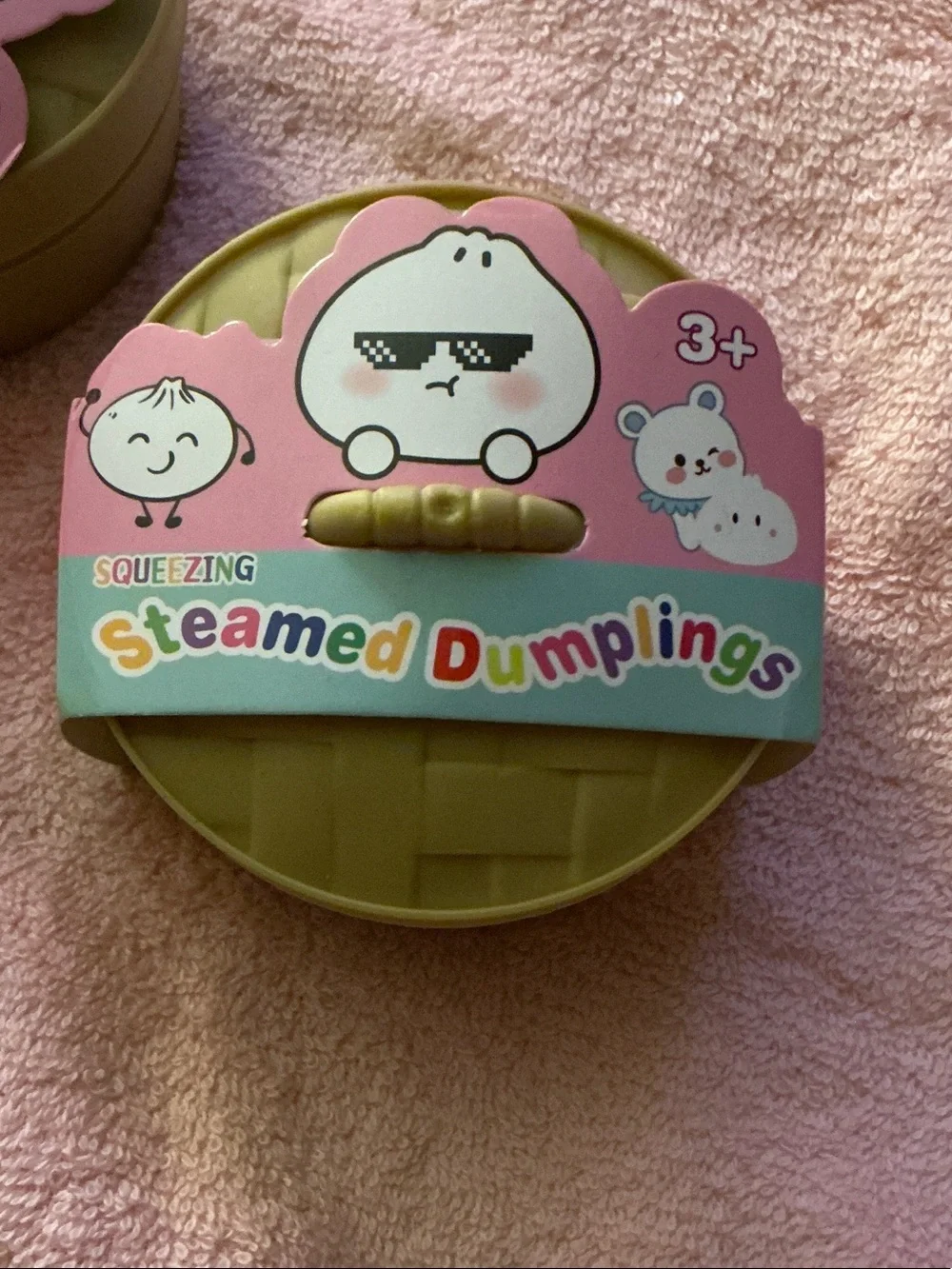 Squeezing Steamed Surprise Glitter Dumplings Stress Squishy.